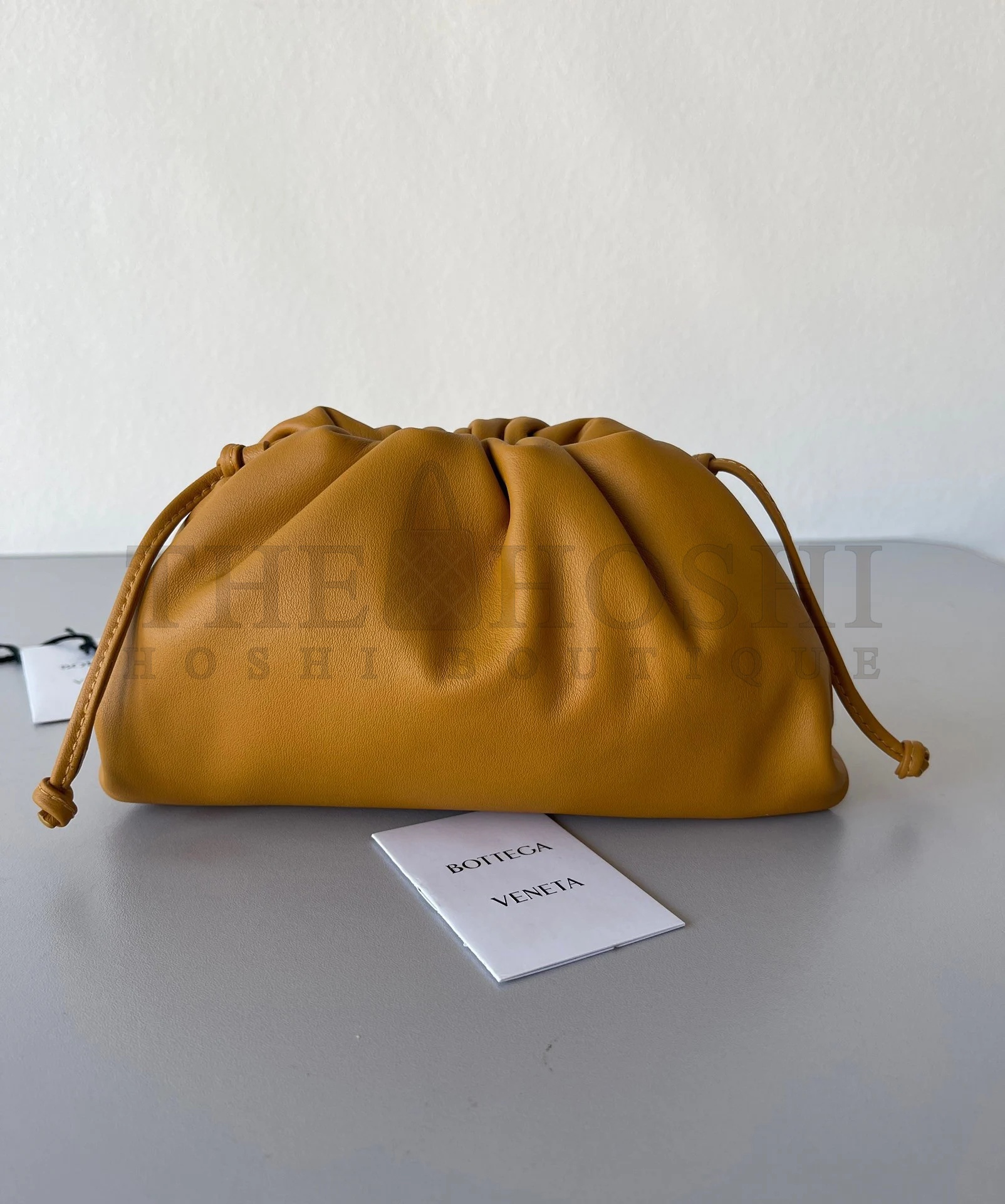 B0tt*ga Ven*ta Mini Pouch with Strap in Teak Calfskin Master Quality