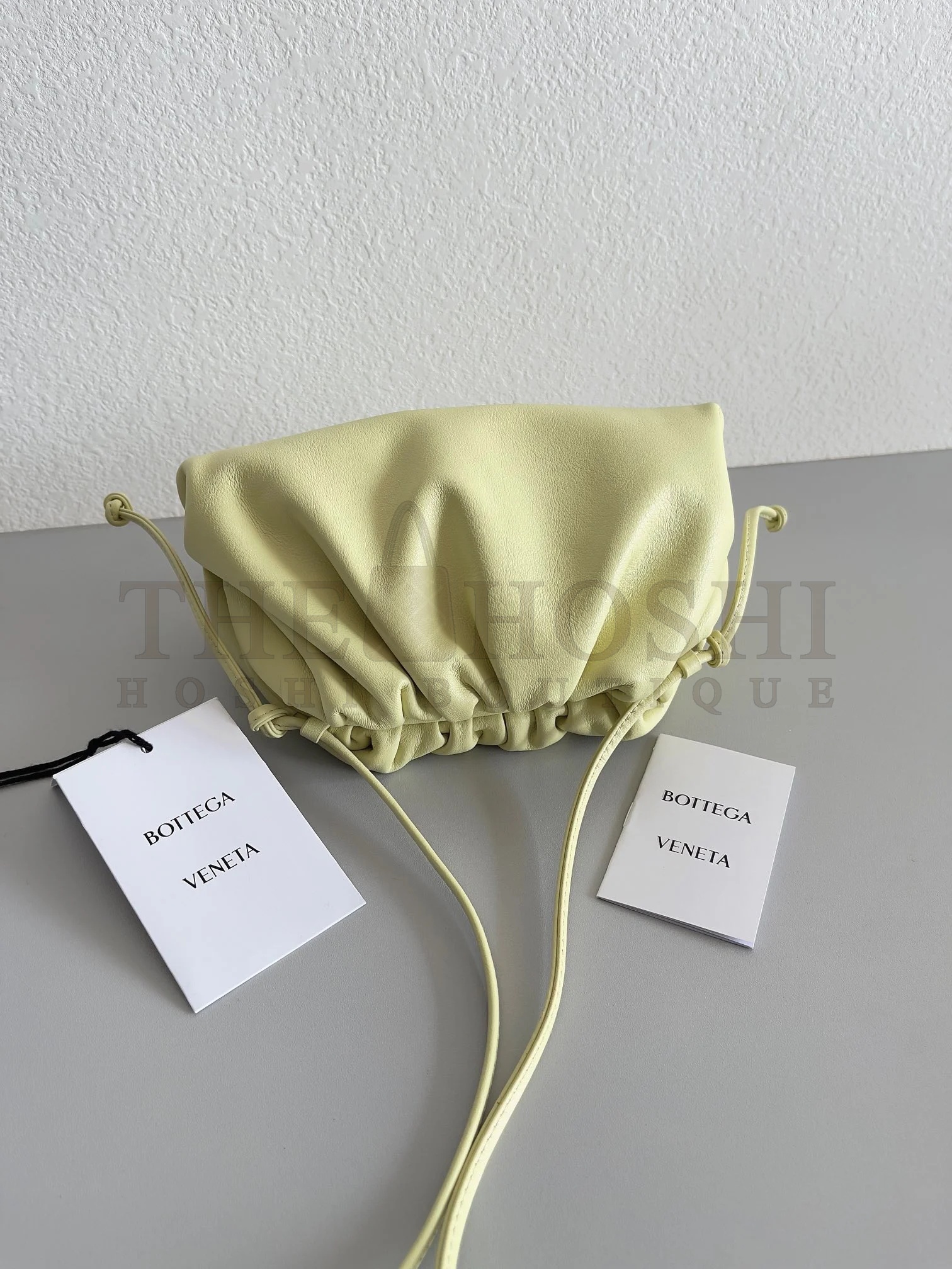 B0tt*ga Ven*ta Mini Pouch with Strap in Zest Washed Calfskin Master Quality